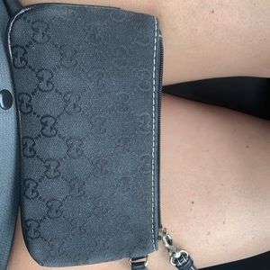 Black Gucci wristlet